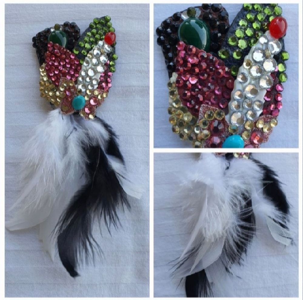 Broche à plumes