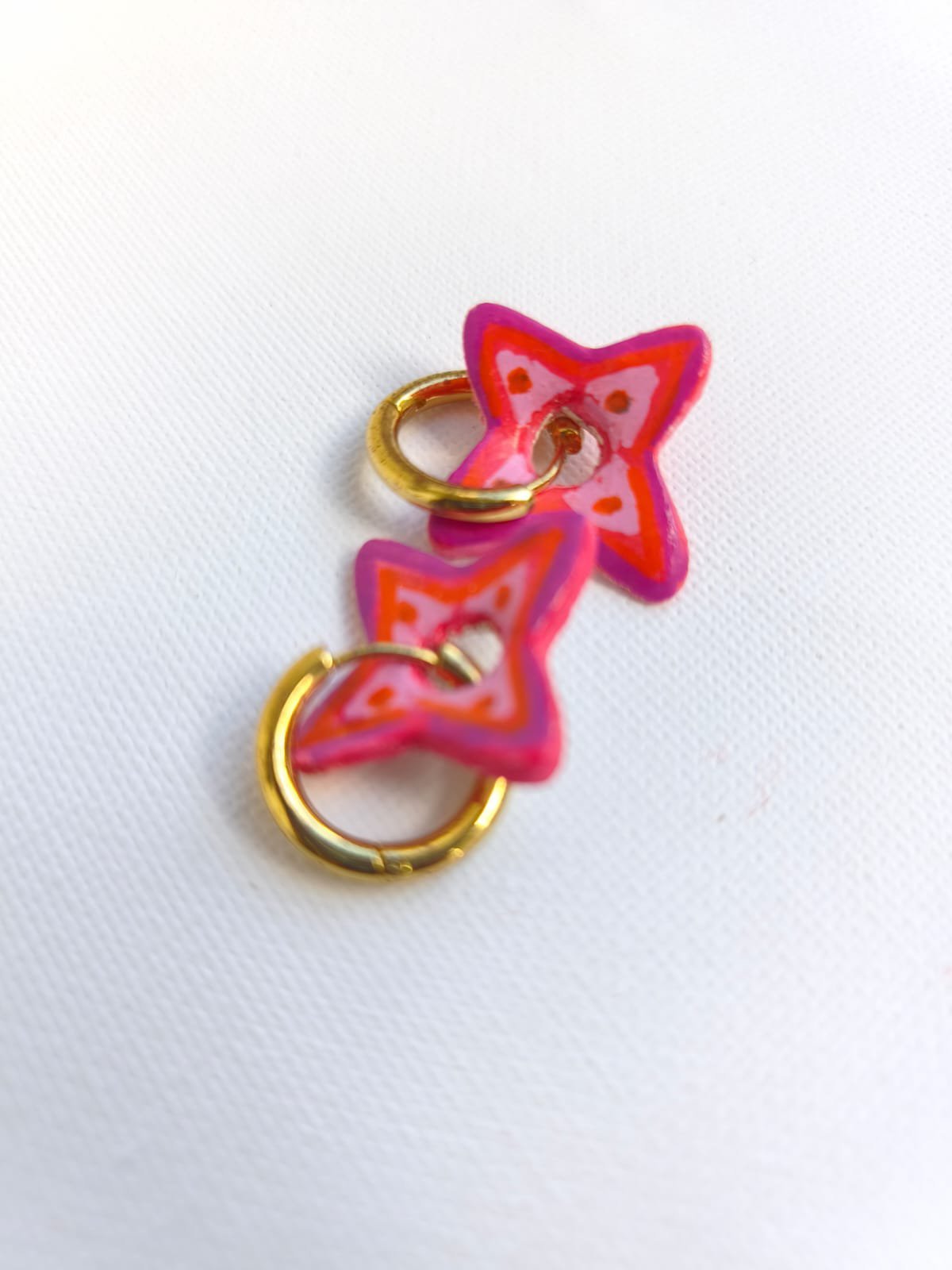 Boucles d'oreilles créoles avec trois motifs