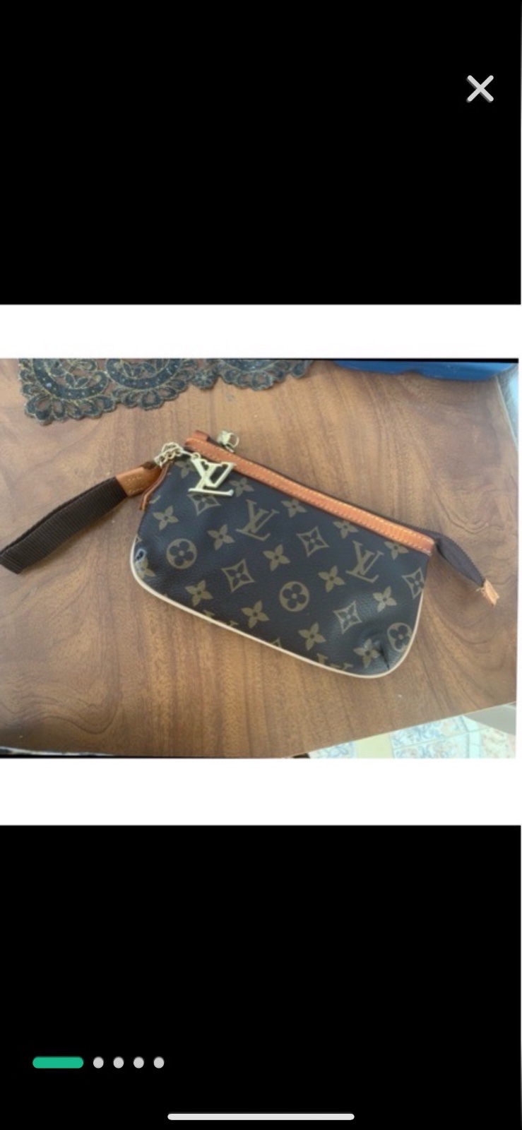 Porte monnaies Vuitton à motif