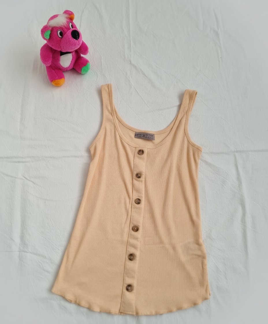 T_shirt sans manche 🌼🌼en trés bon état
