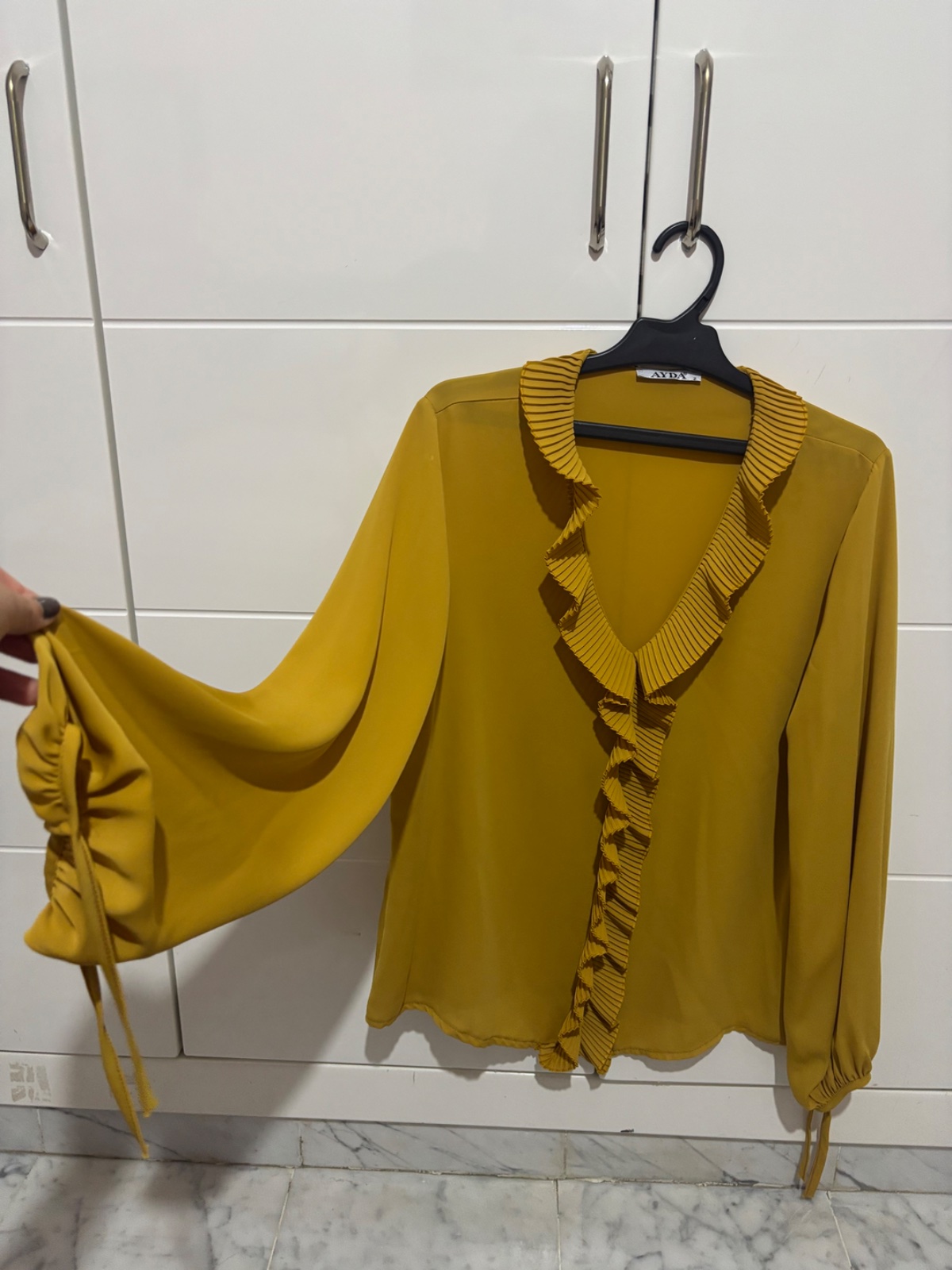 Blouse moutarde jamais portée