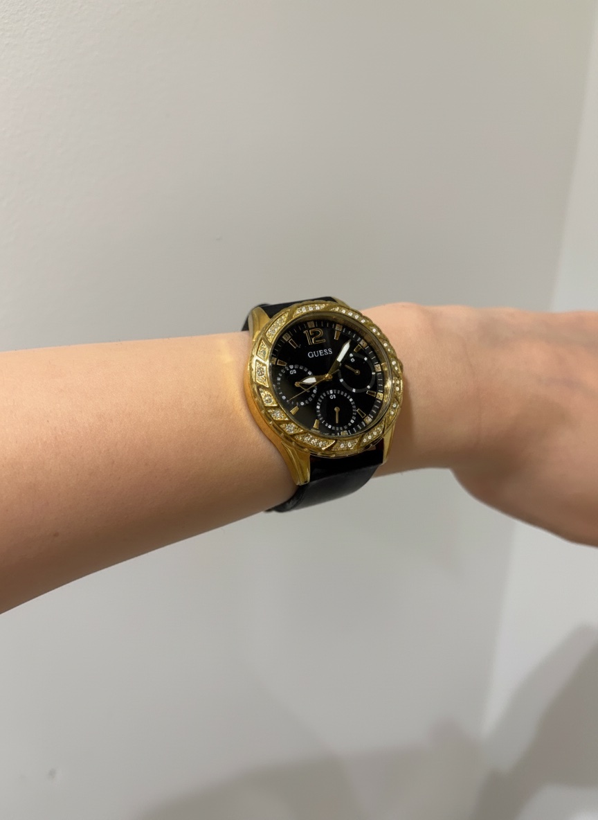 Montre guess noir et dore 