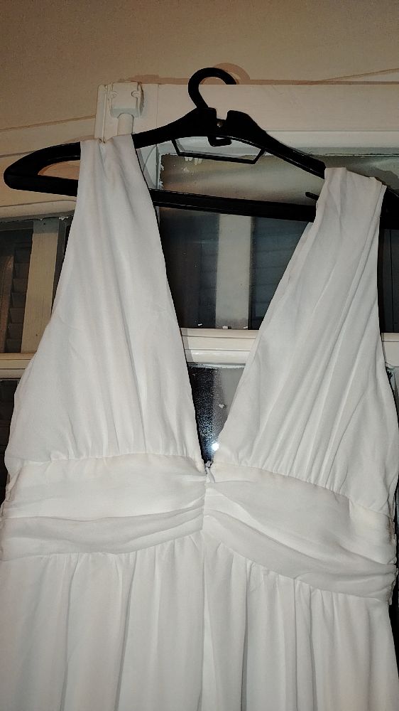 Robe blanc avec fente