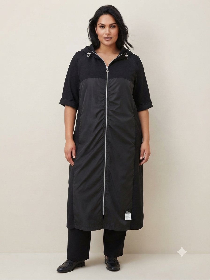 Magnifique veste longue / manteau léger grand taille de la marque Ulla Popken, élégante et confortable. ​en Excellent état.Noir.manches courtes et superbes finitions froncées. ​Taille : 56 (Fr Mélange de jersey doux et empiècements tissés de qualité.