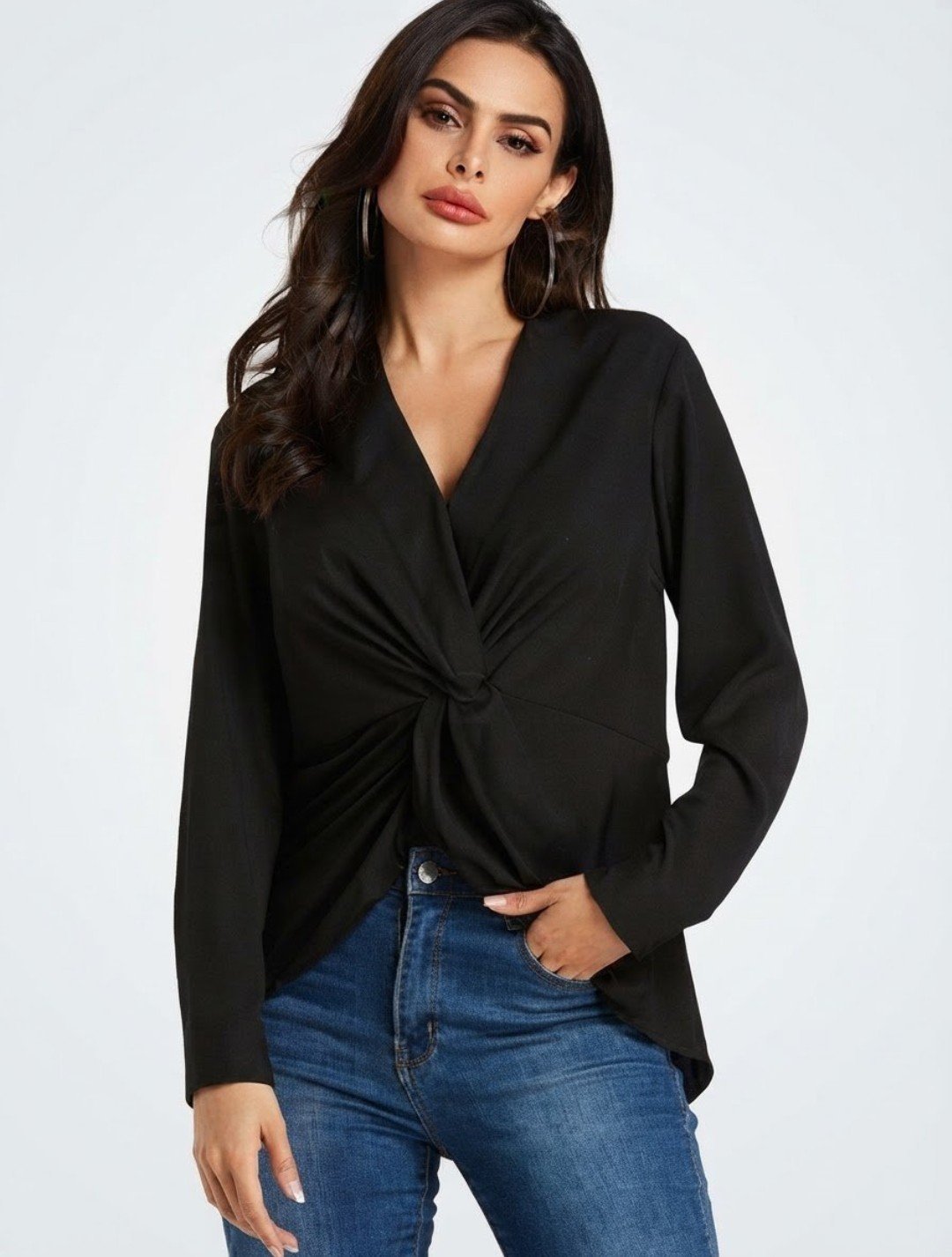 Blouse élégante noire à manches longues avec nœud frontal