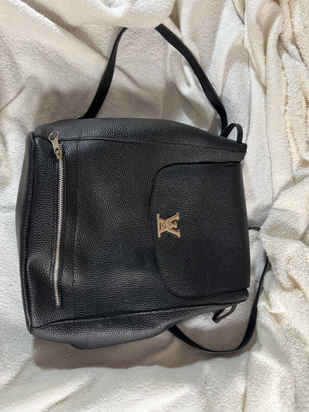 Sac a dos en cuir . 2 compartiments 