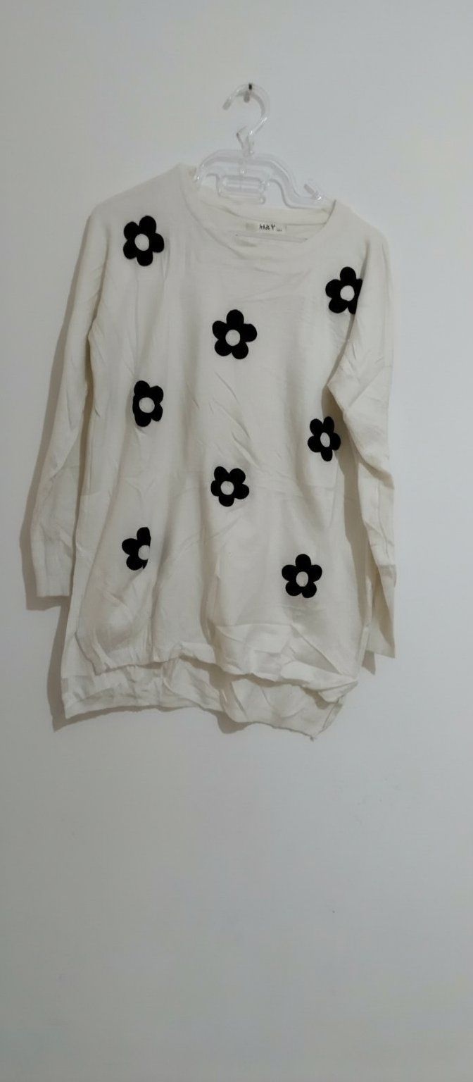 Pull long femme voilée 