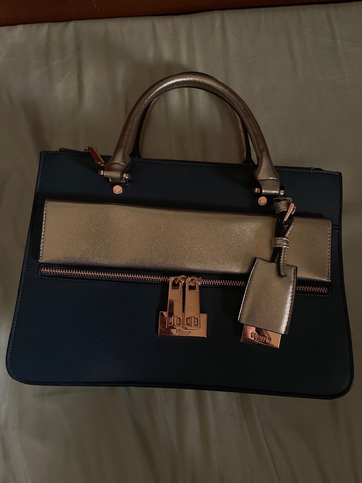 Black and rose gold Dune london bag 