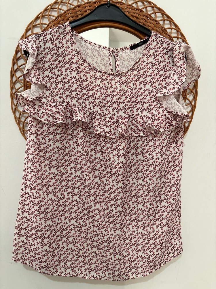 Chemise sans manche