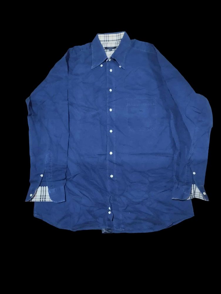 Chemise jean Burberry e en promo 40 dinars 