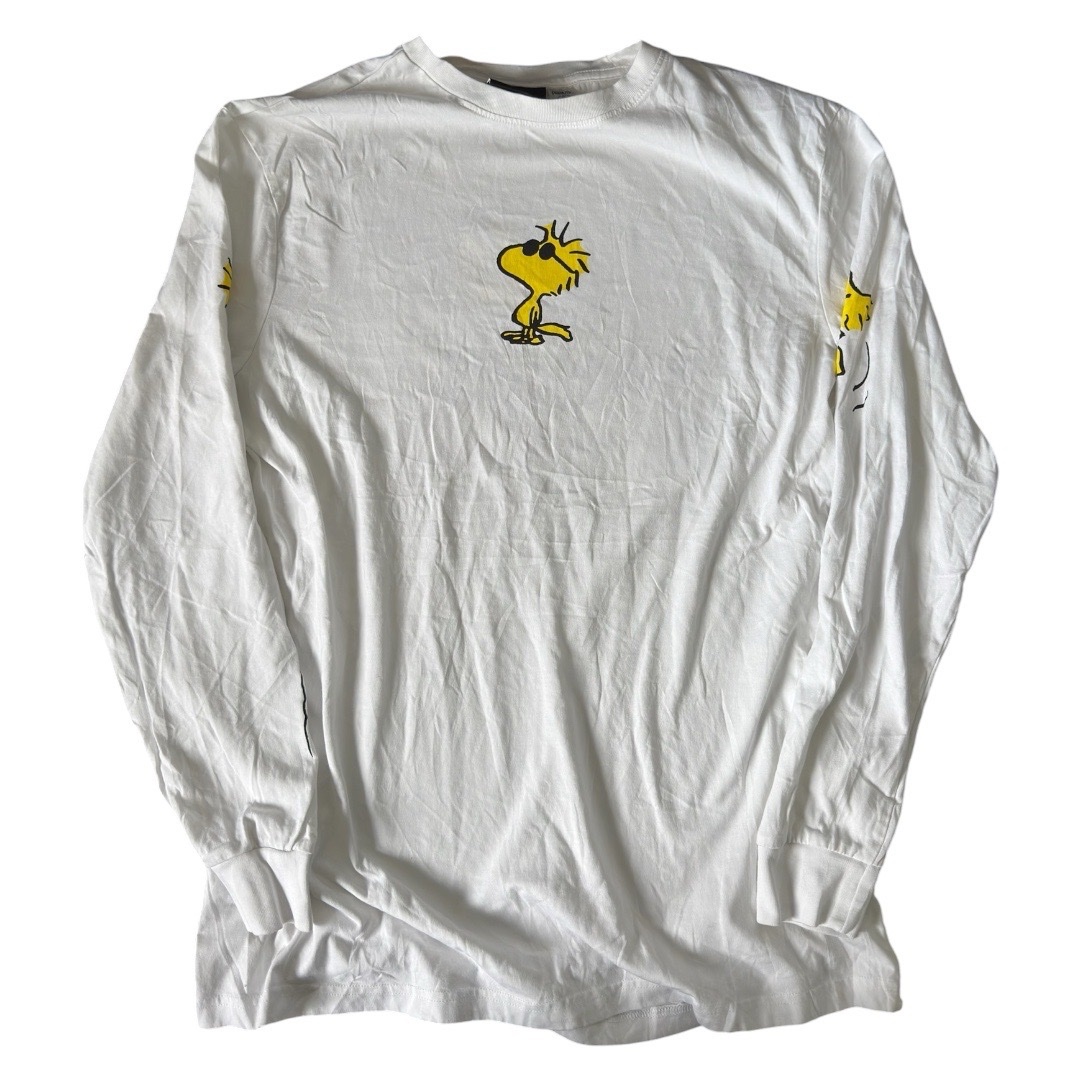 White Peanuts Woodstock long-sleeved T-shirt.
