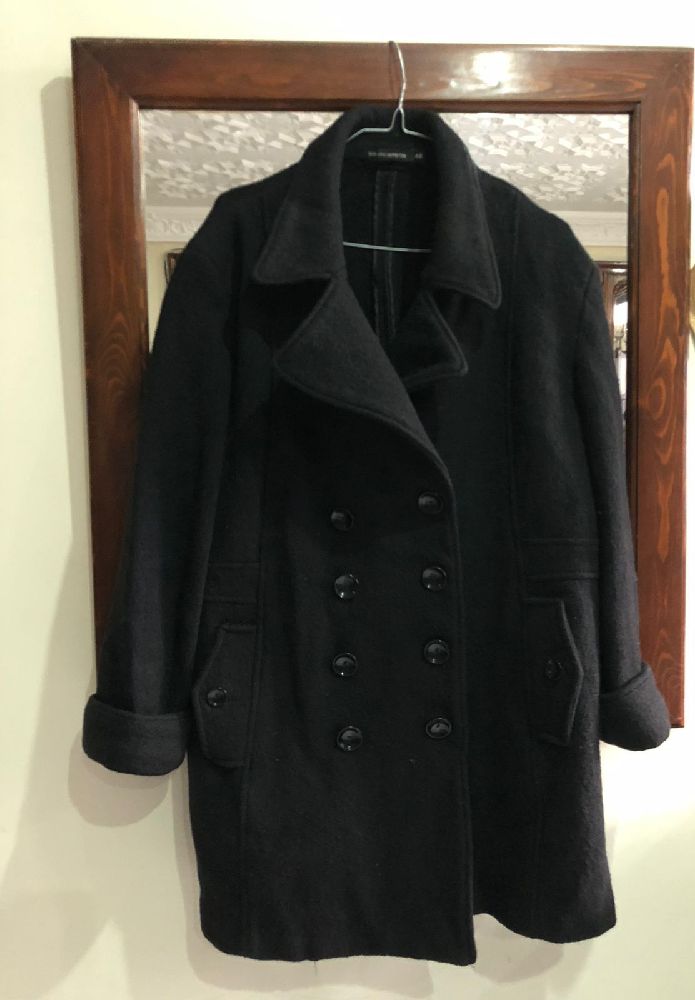un manteau nire marque Monoprix AUTRETON sans  douleur 