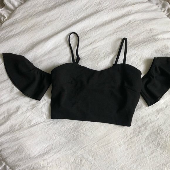 Top de la marque shein couleur noir, taille 36