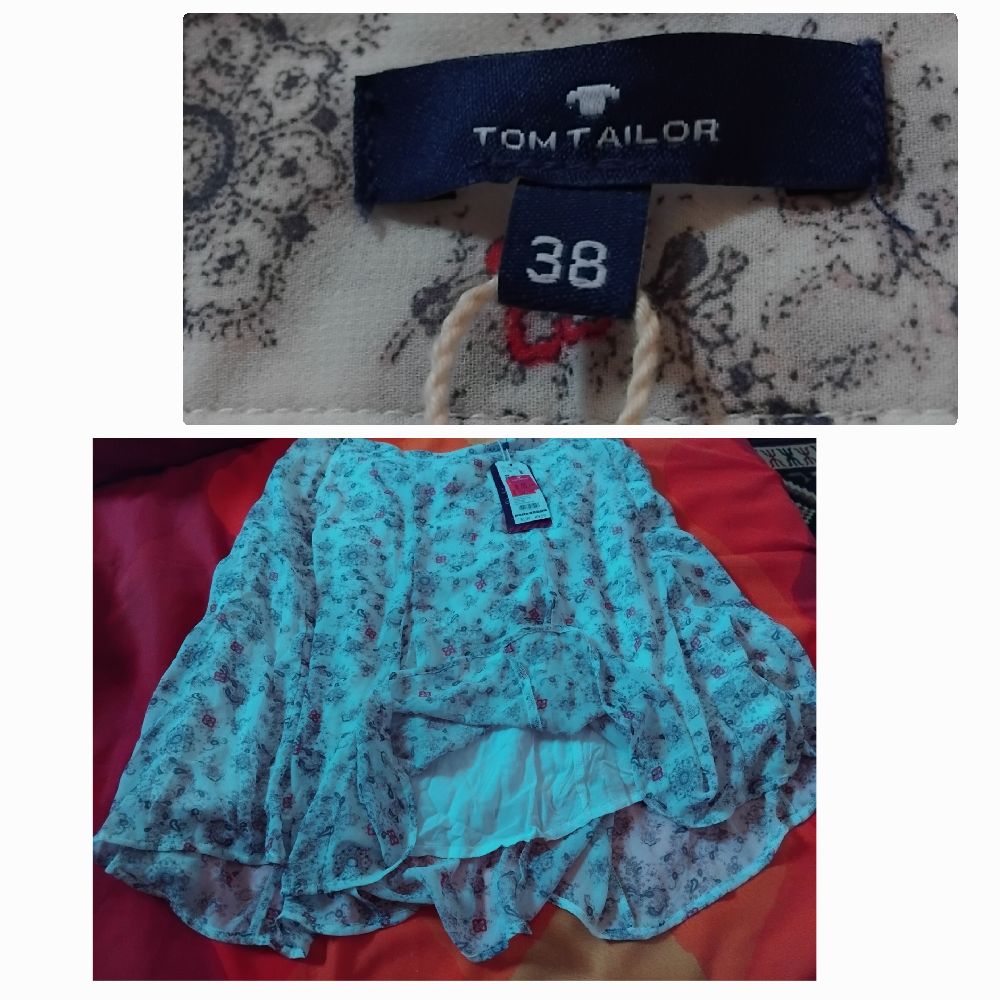 Jupe courte neuf taille 38/40 avec ticket