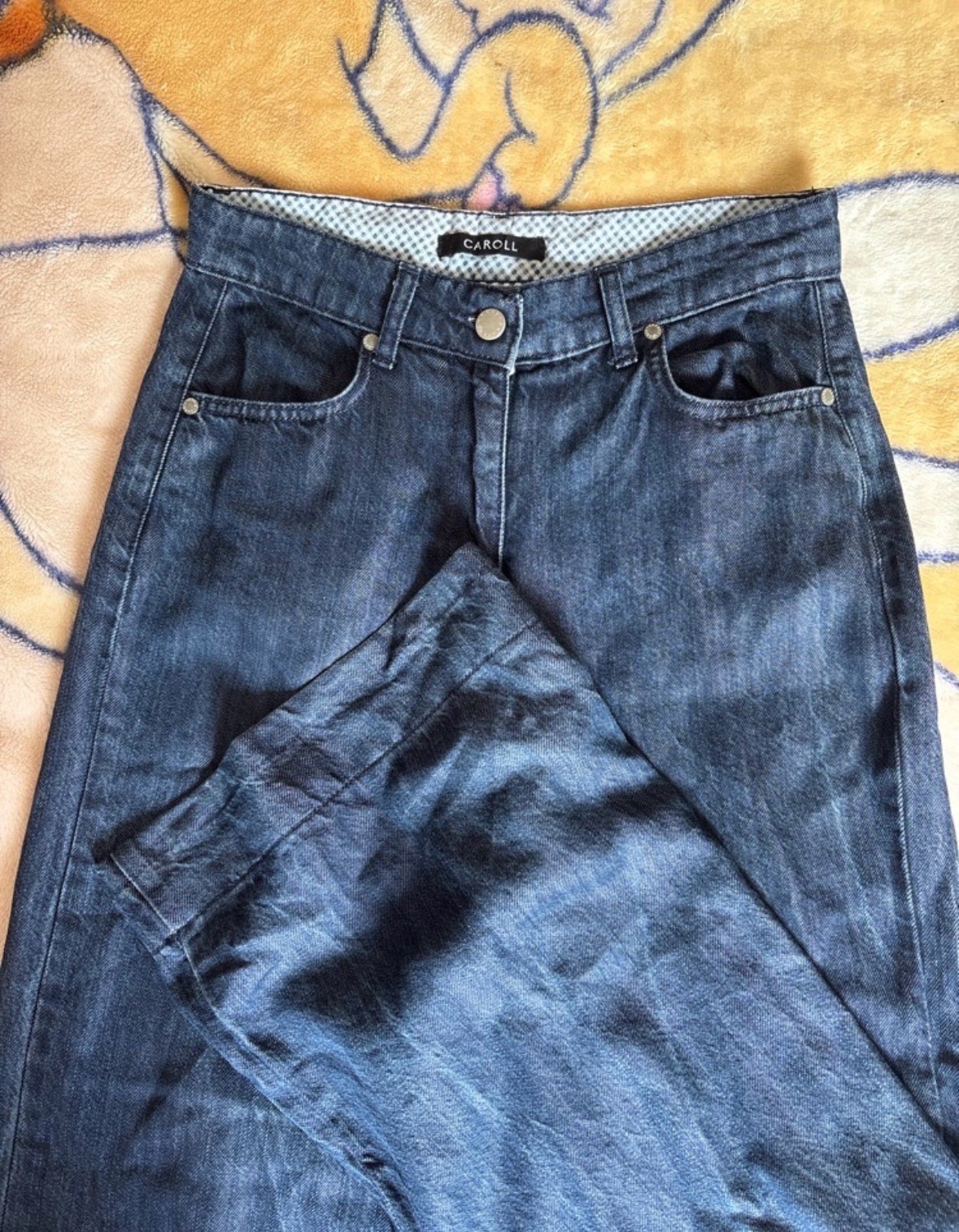Pantalon effet jean taille basse large