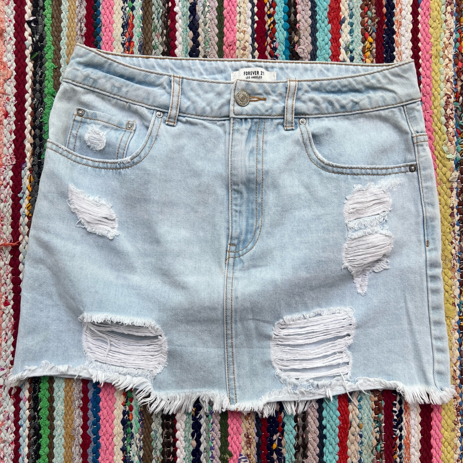 Mini skirt distressed light wash