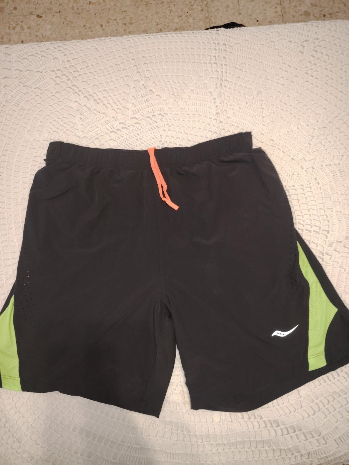 Short saucony running taille. L