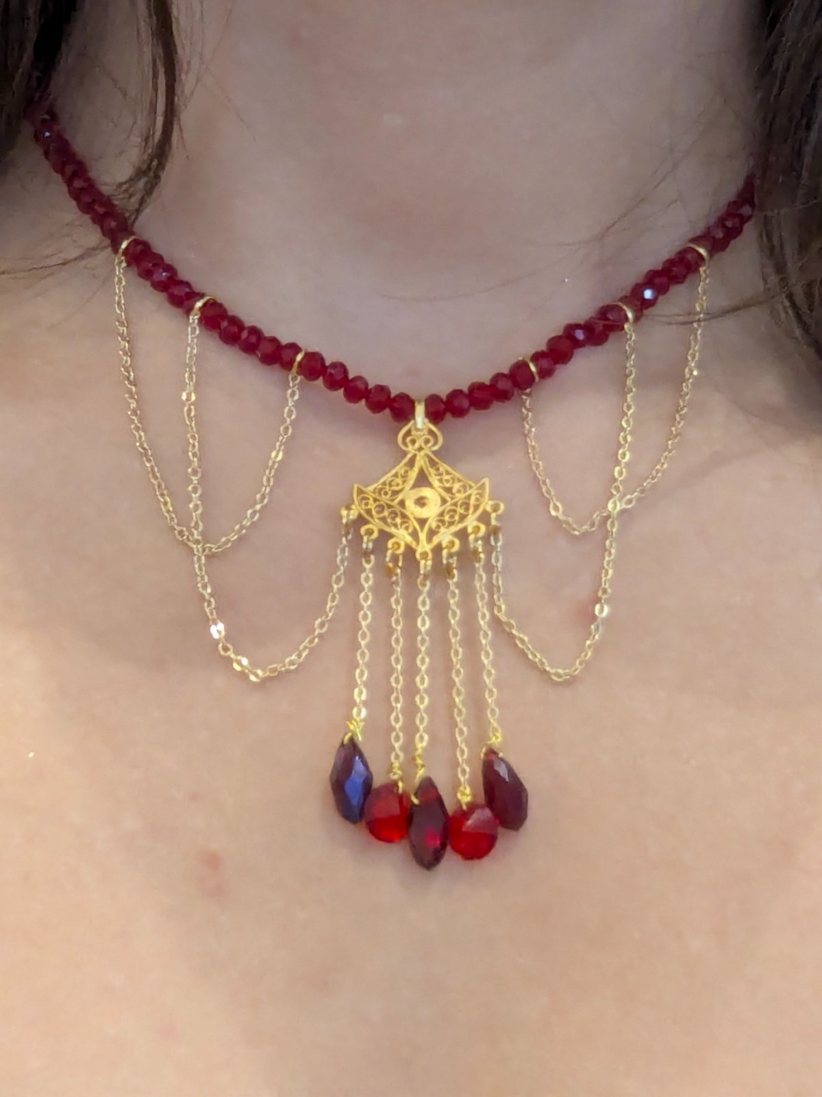 Collier rouge et doré en acier inoxydable