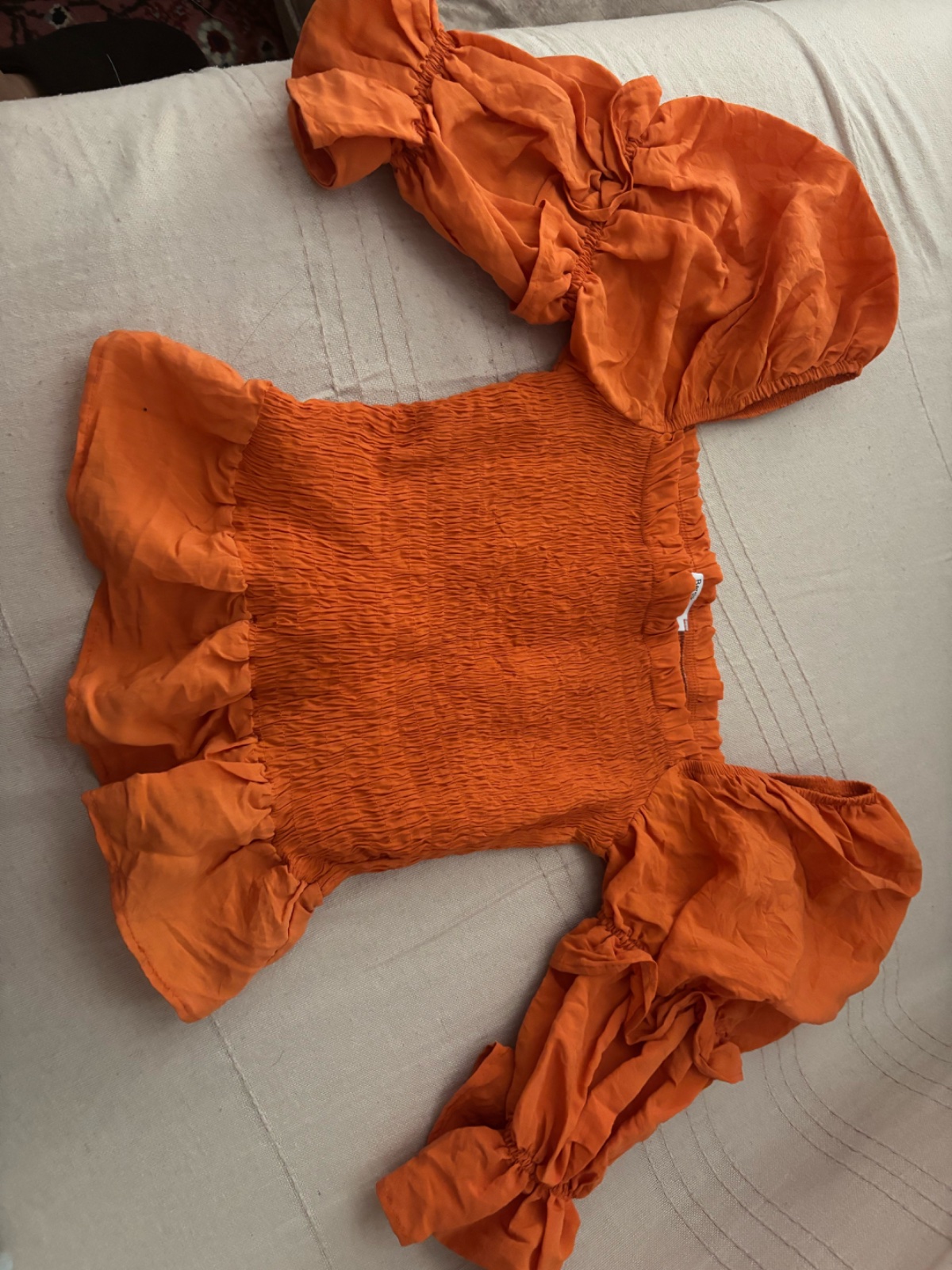 Un haut orangé