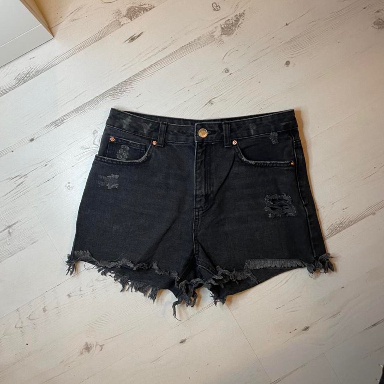 Short en jean noir effet déchiré