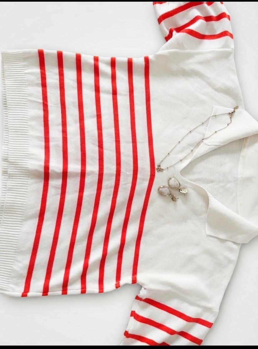 Pull en maille ecru a rayures orangé
