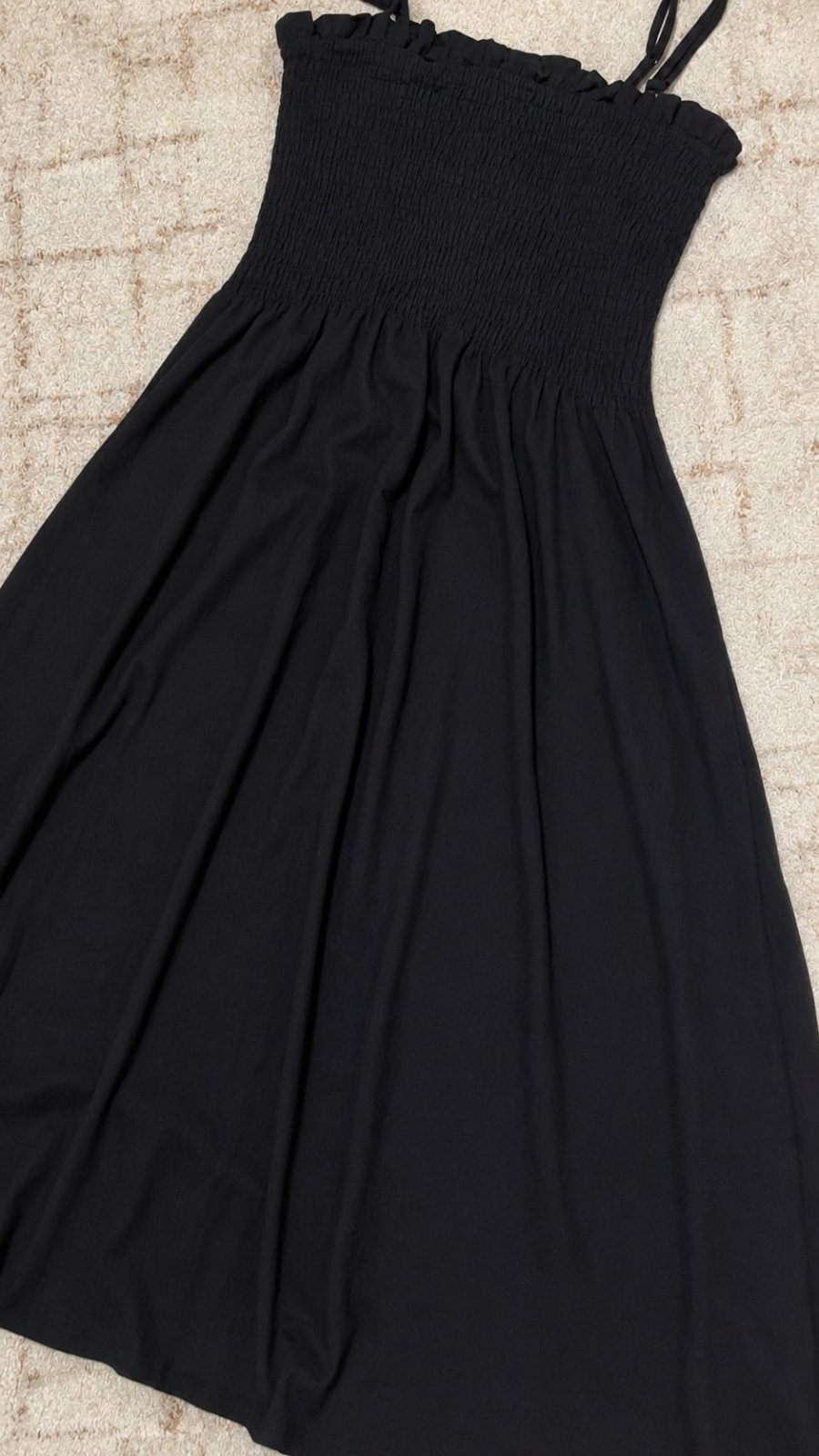 Robe noire avec un smoke 