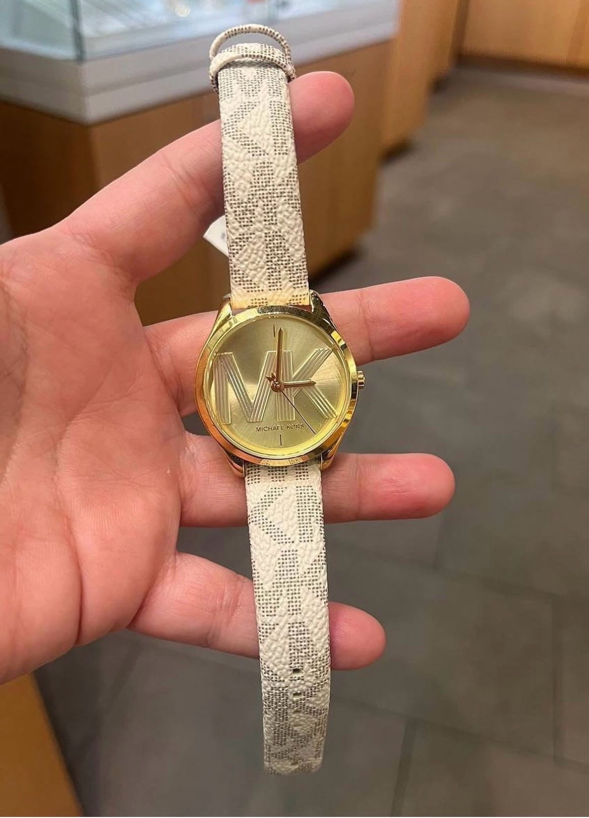 Montre femme Michael Kors dorée originale