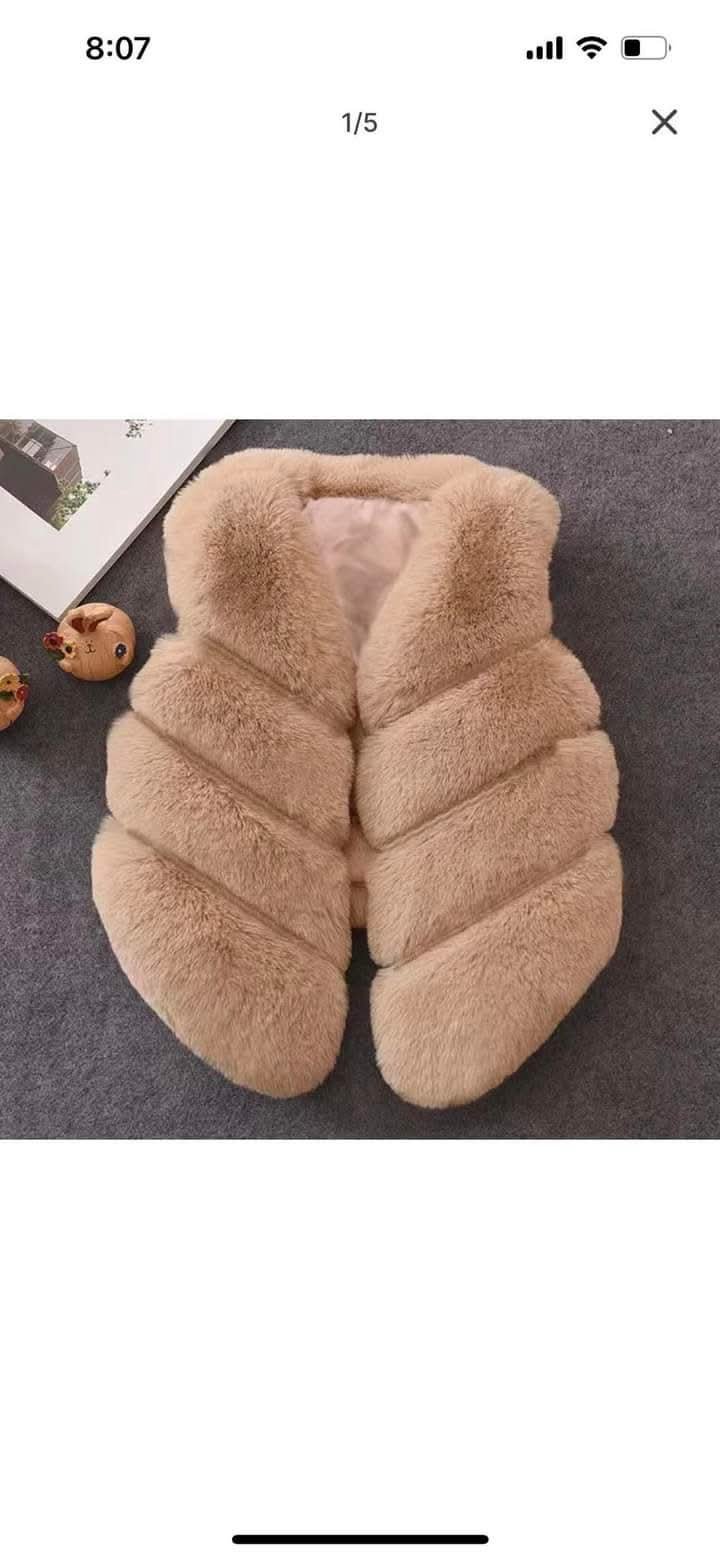 Veste en fourrure taille 3 ans 