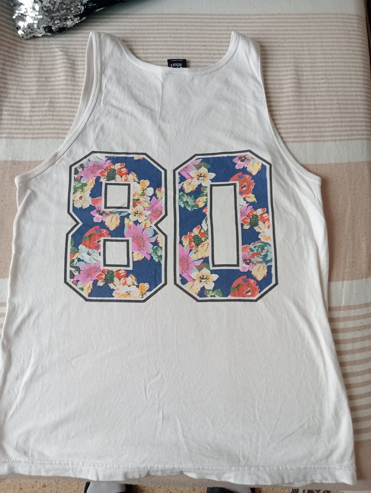 Débardeur Stüssy – Logo "S" Fleuri – Style Streetwear/Surf