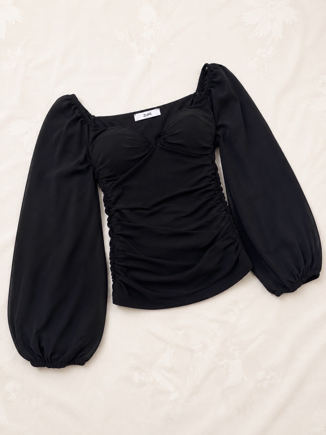 Black zuki puff sleeve top