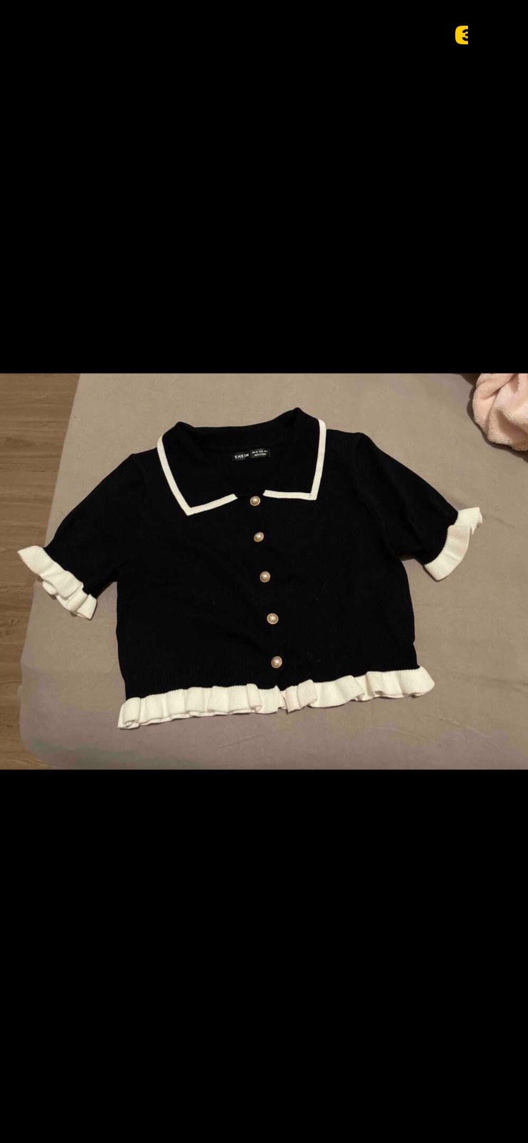 Pull noir chic