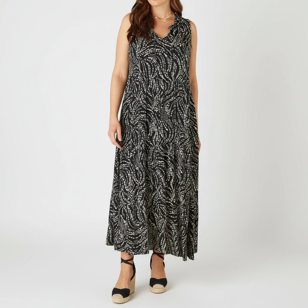 Longue robe noire et blanche à volants taille 42/44  de la marque Laura Torelli