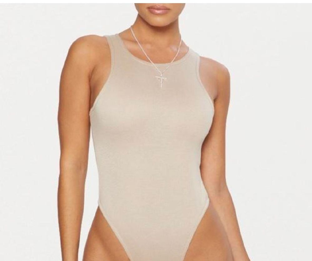 Bodysuit lycra en coton beige tout neuf  taille m/L Pretty little things