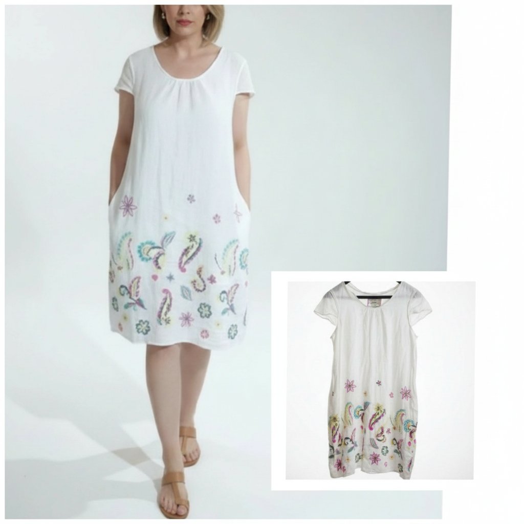 Belle robe pas courte blanche avec de belles broderies en tissu lin et une doublure en coton taille 40/42 de la marque Malvin