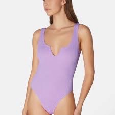 🔥🔥body en maille côtelée lilas  présente une décolleté en V stylisé. Taille S M 