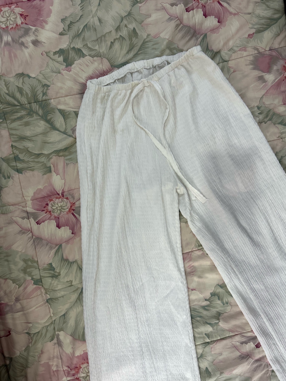 Pantalon blanc d'étè trés bon état taille M/L