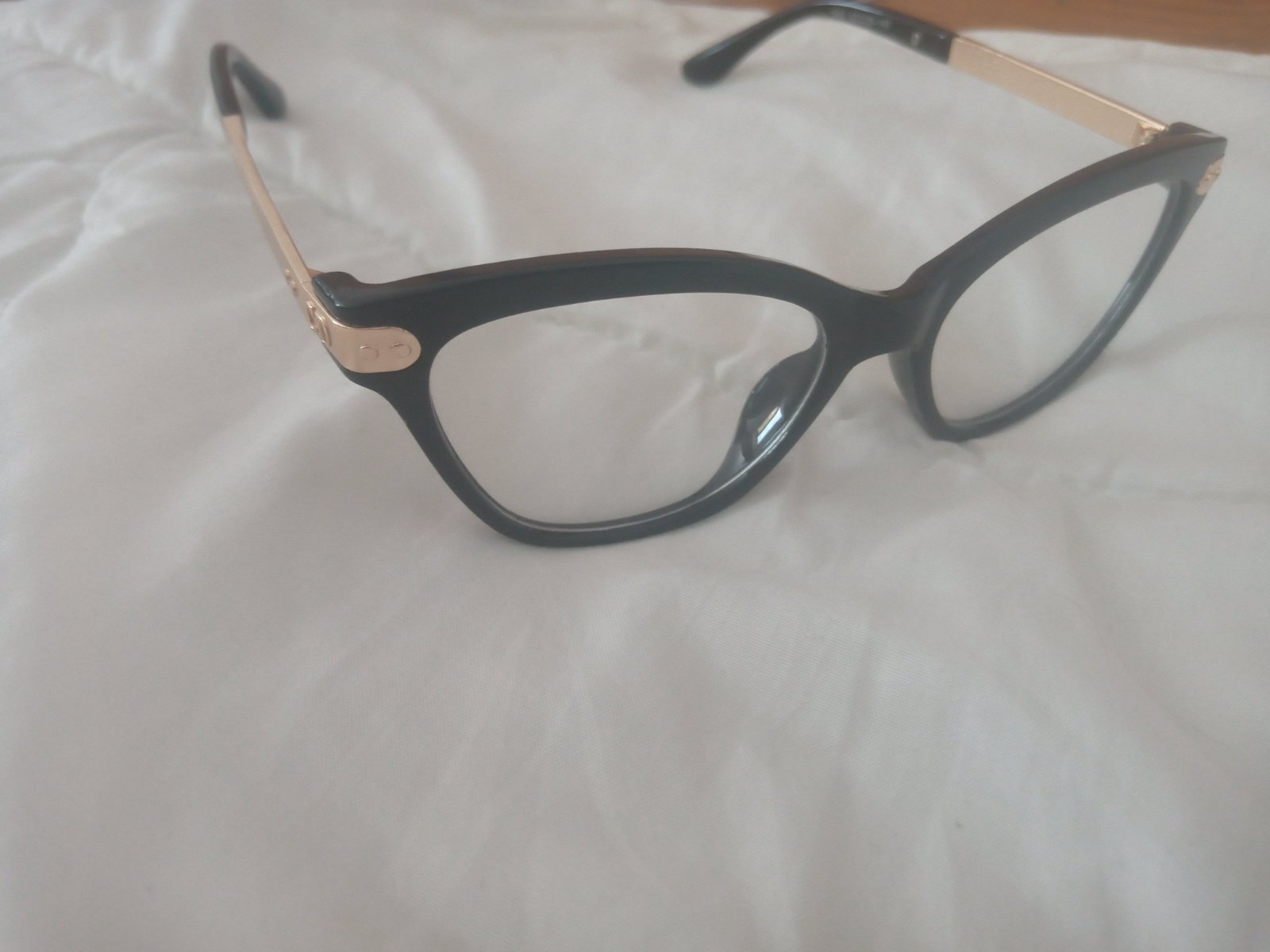Lunette noir et dorée neuf