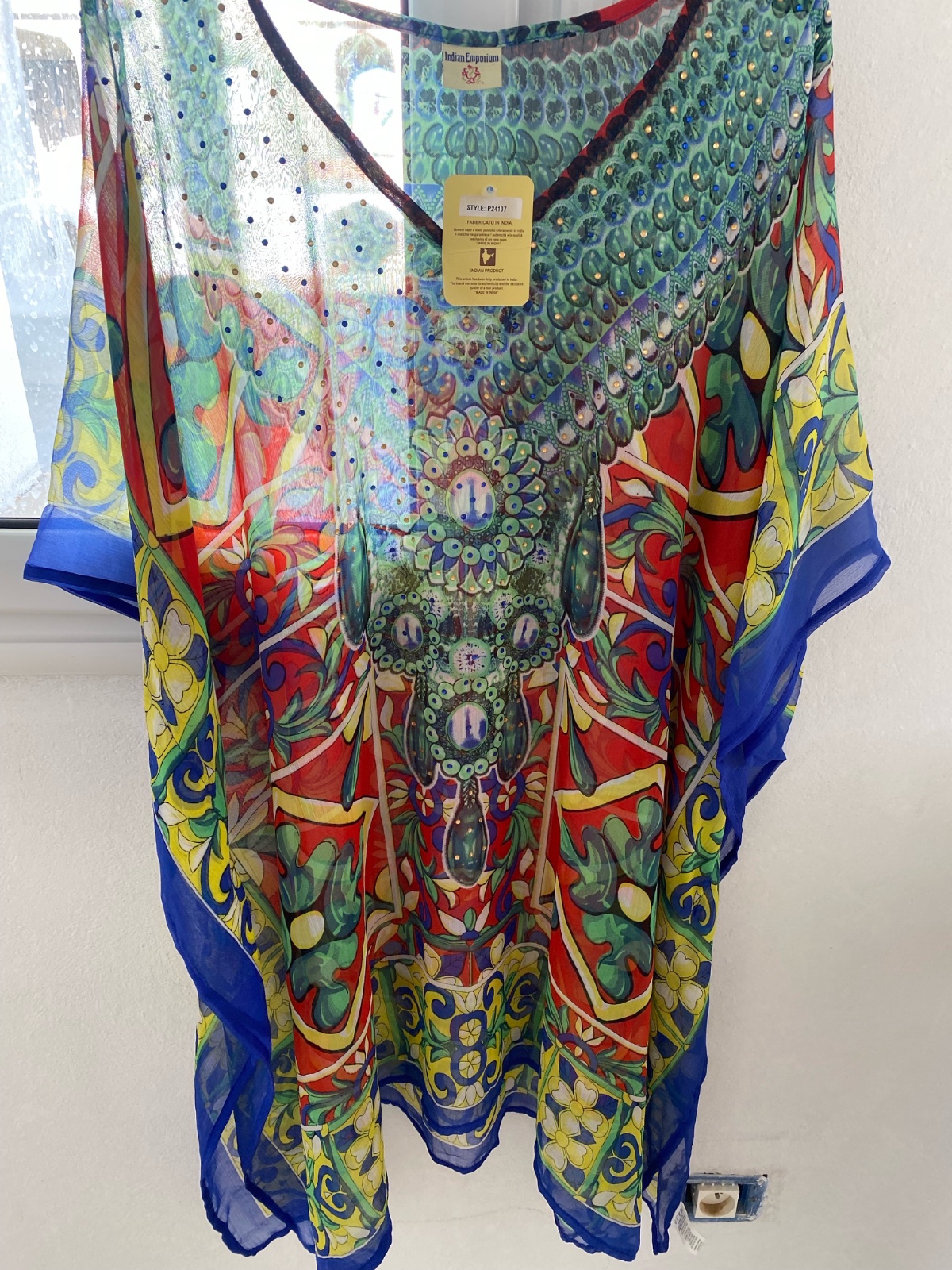 Poncho comme cache mayot