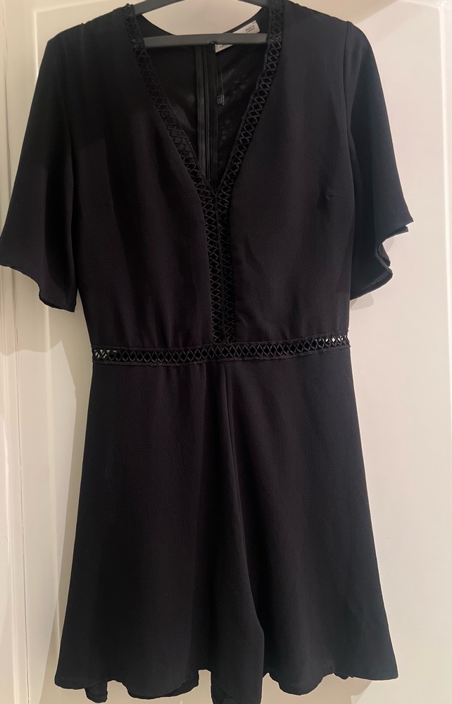 Combinaison short noir en trés bon état 