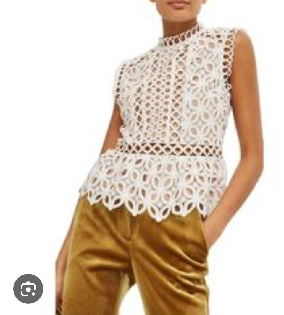 Très jolie haut blanc taille S/M