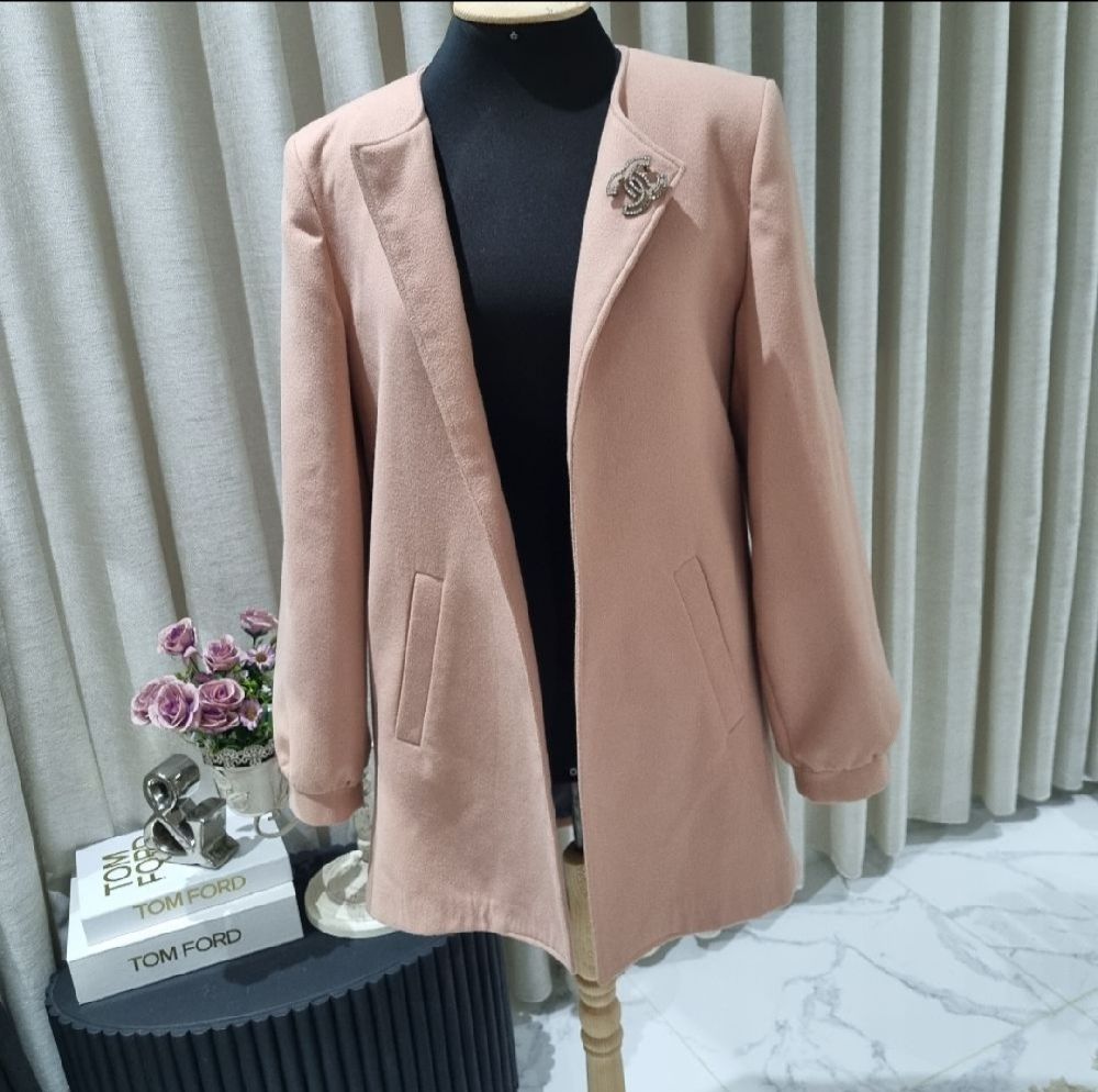 Joli manteau rose poudré 