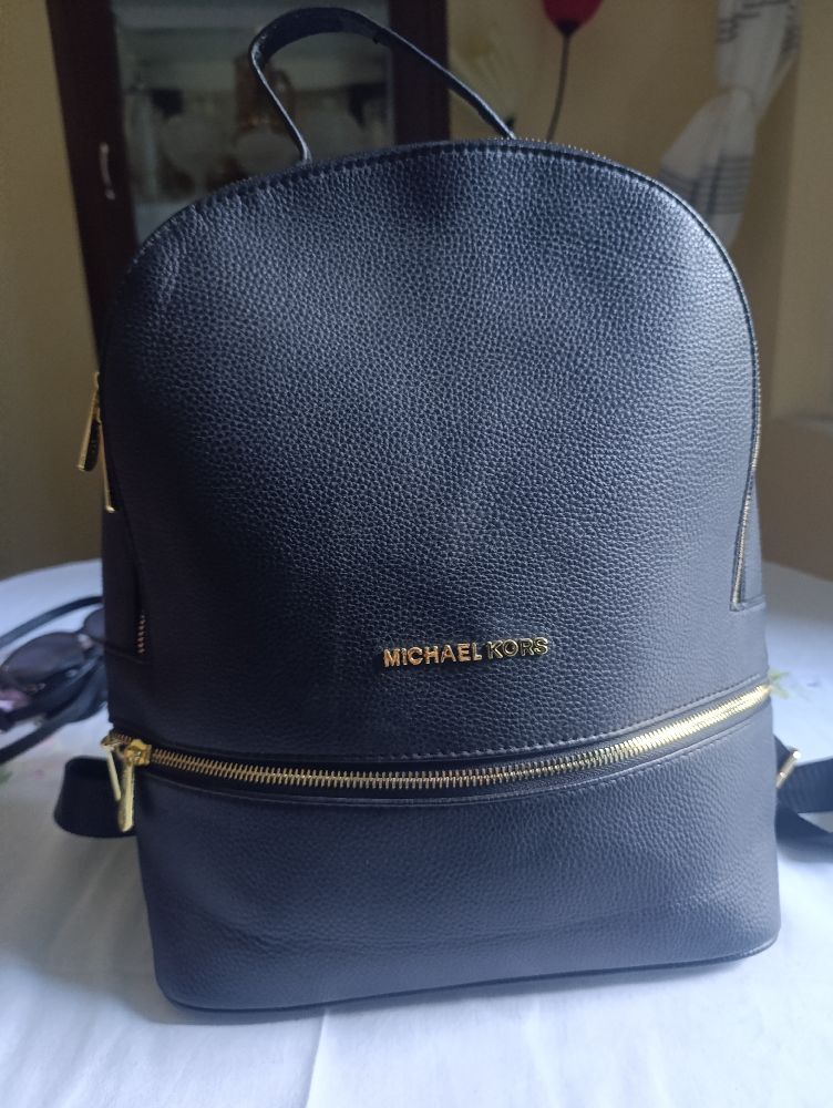 Un sac á dos de la marque Michael kors 