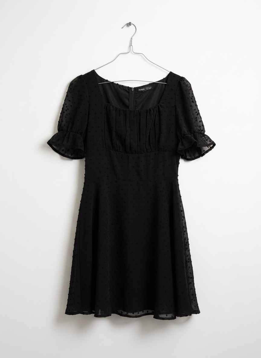 Robe à pois à manches bouffantes