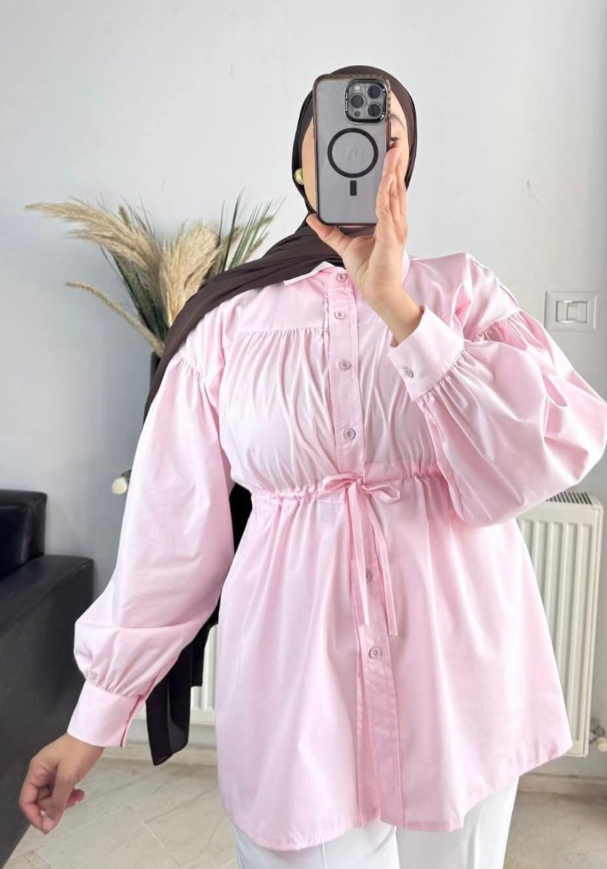 Chemise rose bébé jamais porté 