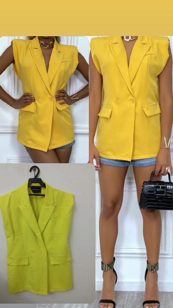 très jolie blazer sans manche un peu bouffante au épaules 