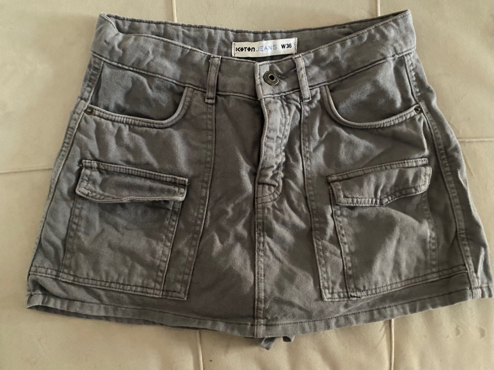 Jupe short coton gris