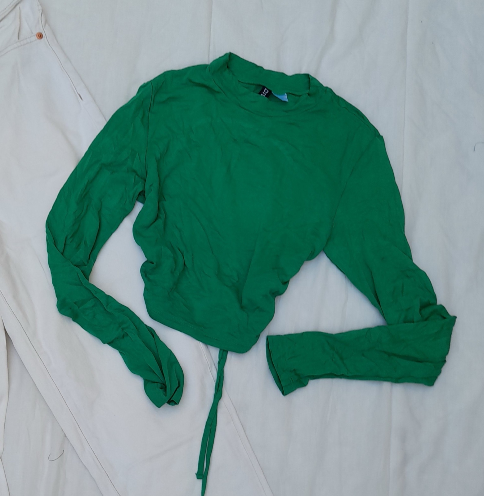 Pull vert dos nu H&M