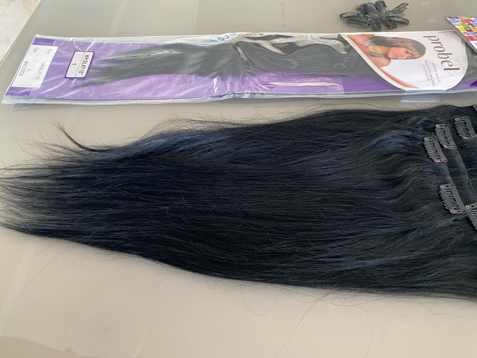 Extenssion  cheveux 100% naturels couleur noir longeur 50 cm 