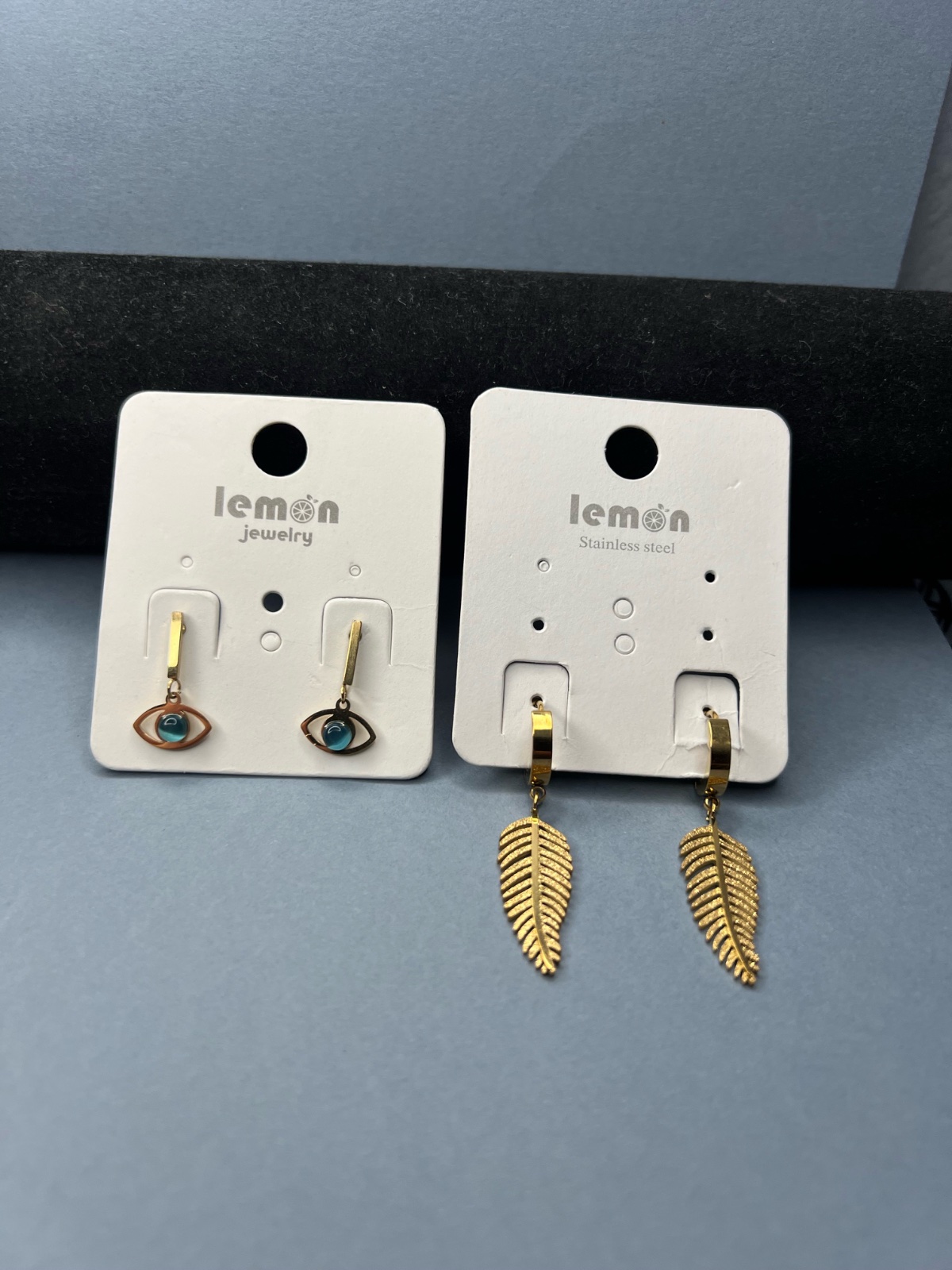 2 stainless steel golden earrings 