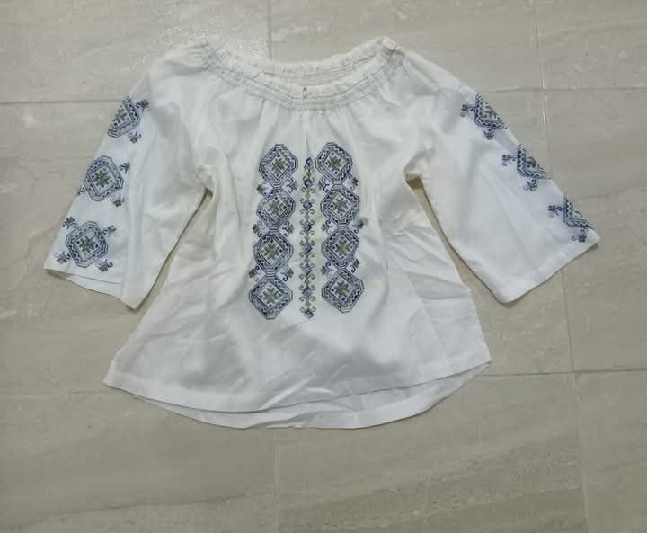 chemise blanche bordé